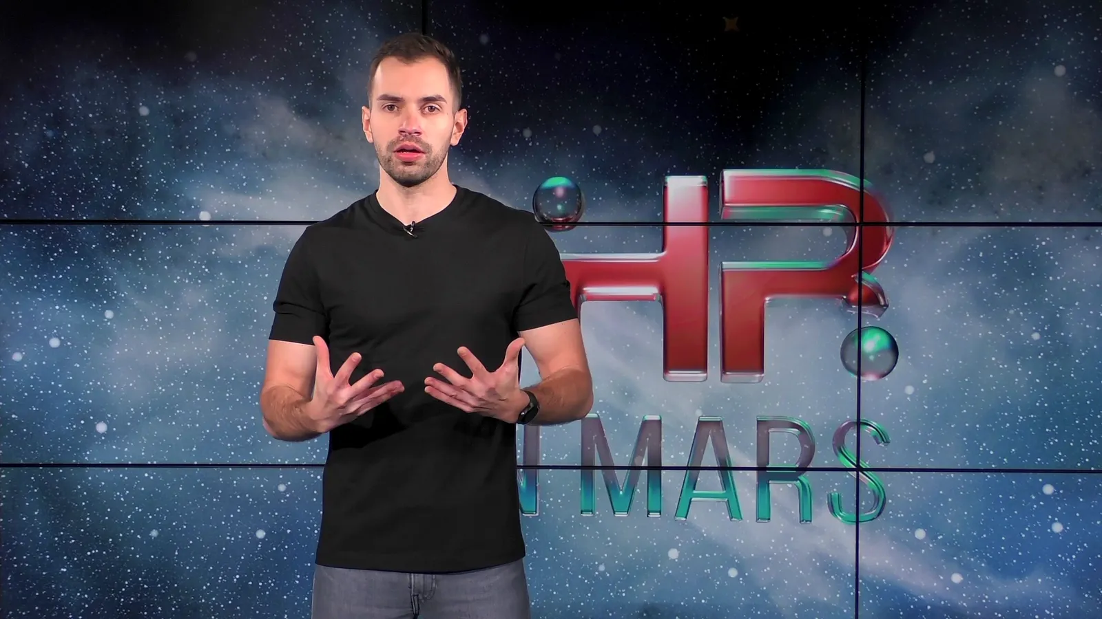 Visuel de l’édition 3.0 : un intervenant filmé devant un fond étoilé, à côté du logo HRonMars.